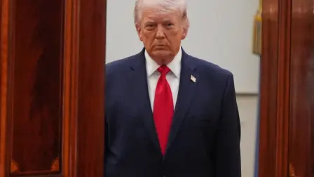 US President Donald Trump arrives to speak at a televised address on the conflict in the Middle East from the Cross Hall of the White House in Washington, DC on April 1, 2026. US President Donald Trump vowed to attack Iran relentlessly over the coming two to three weeks, saying American forces were nearing completion of the war. (Photo by Alex Brandon / POOL / AFP)