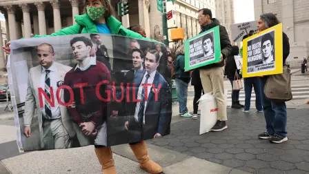 NEW YORK, NEW YORK - JANUARY 09: Supporters of Luigi Mangione wait in line to enter Manhattan Federal Court on January 09, 2026 in New York City. Lawyers for Mangione attorneys are in court for the 27-year-old accused killer to try to avoid the death penalty in the fatal shooting of Brian Thompson, UnitedHealthcares top executive in 2024.   Michael M. Santiago/Getty Images/AFP (Photo by Michael M. Santiago / GETTY IMAGES NORTH AMERICA / Getty Images via AFP)