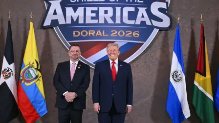 US President Donald Trump poses with President of Costa Rica Rodrigo Chaves (L) at the beginning of the "Shield of the Americas" Summit at Trump National Doral in Miami, Florida, March 7, 2026. President Trump is hosting a dozen right-wing leaders from Latin America and the Caribbean to discuss issues facing the region, from organized crime to illegal immigration. The summit also aims to serve Washington by boosting US interests in the region and curbing those from foreign powers like China. (Photo by SAUL LOEB / AFP)