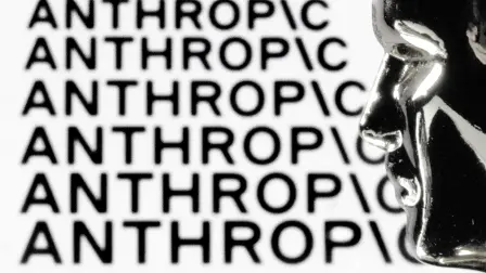 This photograph shows a figurine in front of the logo of the US artificial intelligence safety and research company Anthropic during a photo session in Paris on February 13, 2026. (Photo by JOEL SAGET / AFP)