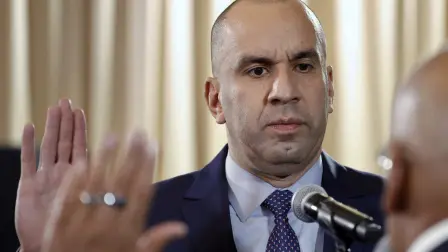 In this handout picture released by the National Assembly of Venezuela, Larry Devoe (R) is sworn in as interim Attorney General before the president of the National Assembly, Jorge Rodriguez, in Caracas on February 26, 2026. Venezuela's Attorney General Tarek William Saab, a key ally of ousted president Nicolas Maduro, resigned from his post, less than two months after the US military deposed Maduro, the National Assembly announced on February 25. (Photo by Handout / NATIONAL ASSEMBLY OF VENEZUELA / AFP) / RESTRICTED TO EDITORIAL USE - MANDATORY CREDIT "AFP PHOTO / National Assembly of Venezuela" - NO MARKETING NO ADVERTISING CAMPAIGNS - DISTRIBUTED AS A SERVICE TO CLIENTS