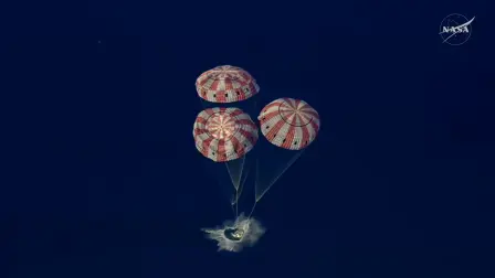 This video grab made from a NASA livestream shows Artemis II astronauts splashing down in the Pacific Ocean off the coast of San Diego, California, on April 10, 2026. Christina Koch, Victor Glover, Jeremy Hansen and Wiseman completed the final phase of their 10-day journey that included a slingshot around the Moon after splashing down into the Pacific Ocean off the coast of California. (Photo by NASA / AFP) / RESTRICTED TO EDITORIAL USE - MANDATORY CREDIT "AFP PHOTO /  NASA " - HANDOUT - NO MARKETING NO ADVERTISING CAMPAIGNS - DISTRIBUTED AS A SERVICE TO CLIENTS