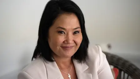 Peru's presidential candidate Keiko Fujimori, for the Fuerza Popular party, gestures during an interview with AFP at the party headquarters in Lima on April 10, 2026. Fujimori, the frontrunner in Peru's presidential race, vowed expel illegal migrants, attract US investment and extend a conservative tide sweeping power in Latin America, in an exclusive interview with AFP on April 10, 2026, on the eve of the April 12 election. (Photo by Ernesto BENAVIDES / AFP)