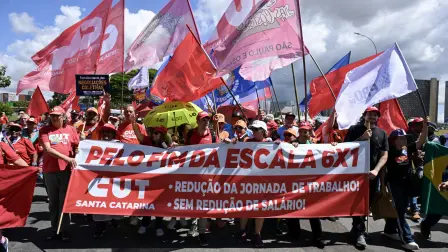 Workers protest for the end of the 6-on-1 work schedule in Brasilia on April 15, 2026. (Photo by Evaristo Sa / AFP)