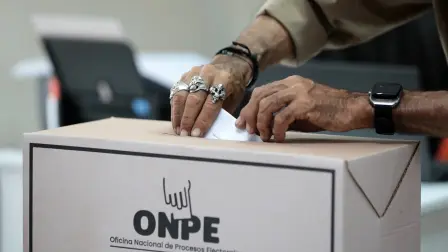 A man casts his ballot during the presidential election at a polling station in Lima on April 12, 2026. Hours-long delays marred Peru's presidential and legislative elections on Sunday, as voters sought to end political chaos that has seen a string of presidents ousted or jailed. (Photo by Connie FRANCE / AFP)