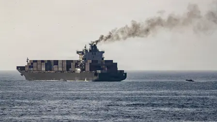 This US Navy handout photograph released on April 21, 2026, by US Central Command Public Affairs shows US forces patrolling the Arabian Sea near the Touska, an Iranian-flagged cargo ship, on April 20, 2026. Iran on April 21 called on the United Nations to condemn the seizure by the United States of an Iranian cargo ship, characterizing the move as an act of piracy and a breach of a ceasefire between Tehran and Washington. The US president announced on April 19 that the US Navy had fired on and then taken control of the Touska cargo ship in the Sea of Oman. (Photo by various sources / AFP) / RESTRICTED TO EDITORIAL USE - MANDATORY CREDIT "AFP PHOTO / US NAVY / NAVCENT PUBLIC AFFAIRS" - HANDOUT - NO MARKETING NO ADVERTISING CAMPAIGNS - DISTRIBUTED AS A SERVICE TO CLIENTS