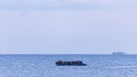 Migrants attempt to cross the English Channel in a smuggler's boat off the coast of Gravelines, northern France, on April 14, 2026. (Photo by Sameer Al-DOUMY / AFP)