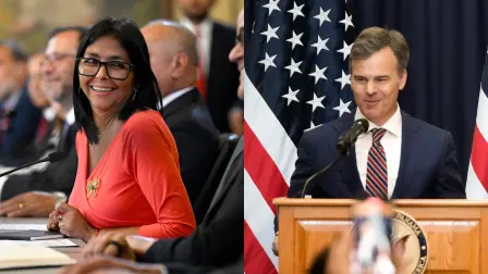 Delcy Rodríguez y John Barret.