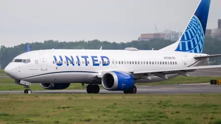 A United Airlines Boeing 737-8 MAX airplane prepares to takeoff at Ronald Reagan Washington National Airport in Arlington, Virginia, on July 10, 2025. (Photo by SAUL LOEB / AFP)