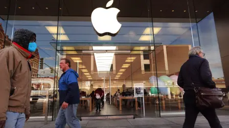 CHICAGO, ILLINOIS - NOVEMBER 28: The Apple company logo hangs above an Apple retail store on November 28, 2022 in Chicago, Illinois. Apple is currently facing shortages in iPhone supplies due to COVID-19 restrictions in China and unrest at one of Apple's major Chinese suppliers.   Scott Olson/Getty Images/AFP (Photo by SCOTT OLSON / GETTY IMAGES NORTH AMERICA / Getty Images via AFP)
