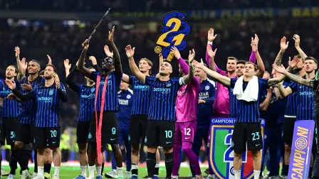 Soccer Football - Serie A - Inter Milan v Parma - San Siro, Milan, Italy - May 3, 2026 Inter Milan's Marcus Thuram, Lautaro Martinez and Nicolo Barella celebrate after winning Serie A REUTERS/Daniele Mascolo