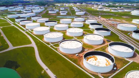 FILE PHOTO: Crude oil storage tanks are seen in an aerial photograph at the Cushing oil hub in Cushing, Oklahoma, U.S. April 21, 2020. REUTERS/Drone Base/File Photo