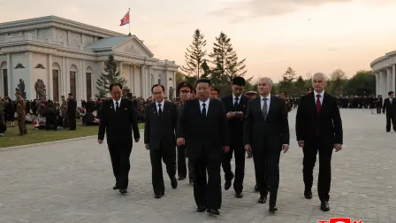 This picture taken on April 26, 2026 and released by North Korea's official Korean Central News Agency (KCNA) via KNS on April 27, 2026 shows North Korean leader Kim Jong Un (C) attending the inauguration ceremony of the Memorial Museum of Combat Feats at the Overseas Military Operations in Pyongyang, alongside Russian State Duma Speaker Vyacheslav Volodin (2nd R) and Russian Defence Minister Andrei Beloussov (R). (Photo by KCNA VIA KNS / AFP) / South Korea OUT / ---EDITORS NOTE--- RESTRICTED TO EDITORIAL USE - MANDATORY CREDIT "AFP PHOTO/KCNA VIA KNS" - NO MARKETING NO ADVERTISING CAMPAIGNS - DISTRIBUTED AS A SERVICE TO CLIENTSTHIS PICTURE WAS MADE AVAILABLE BY A THIRD PARTY. AFP CAN NOT INDEPENDENTLY VERIFY THE AUTHENTICITY, LOCATION, DATE AND CONTENT OF THIS IMAGE. /