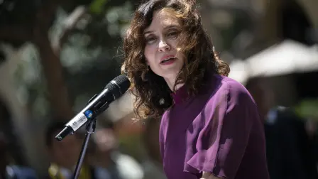 President of the Madrid Region Isabel Diaz Ayuso speaks during the unveiling ceremony of the statue of Spanish conquistador Francisco Pizarro in Lima on January 18, 2025. Two decades after it was removed, the mayor's office of Lima reinstalled on Saturday the controversial equestrian statue of the Spanish conquistador and founder of Lima, Francisco Pizarro. (Photo by Ernesto BENAVIDES / AFP)