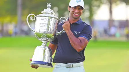 May 17, 2026; Newtown Square, Pennsylvania, USA; Aaron Rai poses with the trophy after winning the final round of the PGA Championship golf tournament. Mandatory Credit: Bill Streicher-Imagn Images