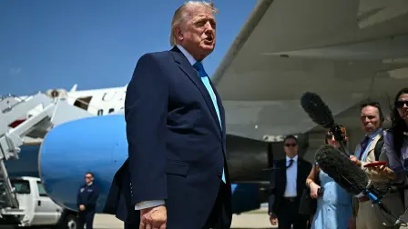 US President Donald Trump speaks to reporters after stepping off Air Force One at Joint Base Andrews, Maryland on May 20, 2026, as he returns to Washington, DC, after delivering the commmencement address to the US Coast Guard Academy's 2026 graduating class. President Trump said that it was a "very big moment" on Wednesday after the Justice Department indicted 94-year-old former Cuban president Raul Castro over the 1996 downing of civilian planes manned by critics of the communist state (also known as the "Brothers to the Rescue" murders). (Photo by Kent NISHIMURA / AFP)