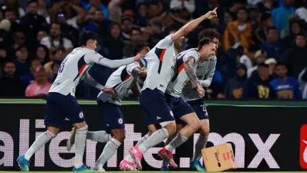Soccer Football - Liga MX - Final - Second Leg - Pumas UNAM v Cruz Azul - Estadio Olimpico Universitario, Mexico City, Mexico - May 24, 2026 Cruz Azul's Rodolfo Rotondi celebrates scoring their second goal with teammates REUTERS/Henry Romero