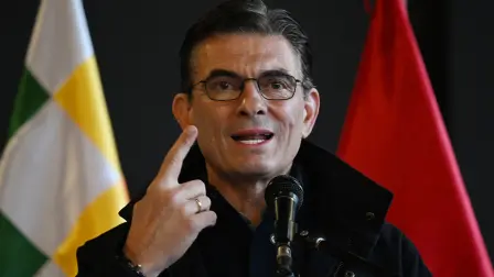 Bolivias president, Rodrigo Paz, gestures as he speaks during the Economic and Social Council for the Homeland in La Paz, on May 27, 2026. The meeting, led by the president, aims to foster dialogue with social, business, and ministerial sectors to overcome a crisis marked by protests and road blockades across the country. (Photo by Aizar RALDES / AFP)