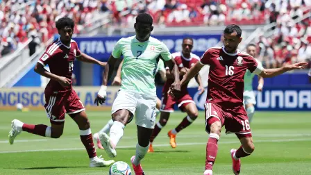 SAN FRANCISCO, CALIFORNIA - JUNE 13: Breel Embolo #7 of Switzerland controls the ball under pressure from Boualem Khoukhi #16 of Qatar during the FIFA World Cup 2026 Group B match between Qatar and Switzerland at San Francisco Bay Area Stadium on June 13, 2026 in San Francisco, California.   Emilee Chinn/Getty Images/AFP (Photo by Emilee Chinn / GETTY IMAGES NORTH AMERICA / Getty Images via AFP)