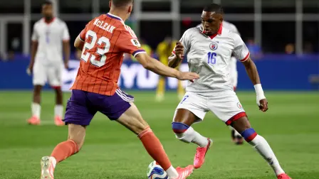 Scotland's midfielder #23 Kenny McLean and Haiti's forward #16 Lenny Joseph fight for the ball during the 2026 World Cup Group C football match between Haiti and Scotland at the Boston Stadium in Foxborough on June 13, 2026. (Photo by FRANCK FIFE / AFP)