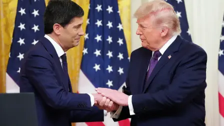 (FILES) US President Donald Trump shakes hands with the new Chairman of the Federal Reserve Kevin Warsh (L) during a swearing in ceremony in the East Room of the White House in Washington, DC on May 22, 2026. US Federal Reserve chief Kevin Warsh will chair his first meeting of the central bank's rate-setting committee next week caught between a rock and a hard place, with inflation at a three-year high and unrelenting pressure from the White House to lower rates. The Fed's 12-member open market committee (FOMC) will begin a two-day meeting on June 16, 2026, and is widely expected to hold rates steady as the effects of US President Donald Trump's war on Iran course through the world's largest economy. (Photo by Aaron Schwartz / AFP)