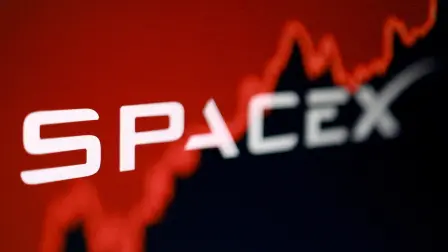 FILE PHOTO: The SpaceX logo and a rising stock graph are seen in this illustration created on June 5, 2026. REUTERS/Dado Ruvic/Illustration/File Photo