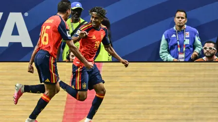 Spain's forward #19 Lamine Yamal (R) celebrates after scoring the opening goal during the 2026 World Cup Group H football match between Spain and Saudi Arabia at the Atlanta Stadium in Atlanta on June 21, 2026.  (Photo by ROBERTO SCHMIDT / AFP)