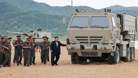 This picture taken on June 25, 2026 and released by North Korea's official Korean Central News Agency (KCNA) on June 26, 2026, shows North Korean leader Kim Jong Un (C) inspecting weapons at North Korea's National Defense Science Research Institute. (Photo by KCNA / KCNA VIA KNS / AFP) / South Korea OUT / ---EDITORS NOTE--- RESTRICTED TO EDITORIAL USE - MANDATORY CREDIT "AFP PHOTO/KCNA VIA KNS" - NO MARKETING NO ADVERTISING CAMPAIGNS - DISTRIBUTED AS A SERVICE TO CLIENTSTHIS PICTURE WAS MADE AVAILABLE BY A THIRD PARTY. AFP CAN NOT INDEPENDENTLY VERIFY THE AUTHENTICITY, LOCATION, DATE AND CONTENT OF THIS IMAGE. /