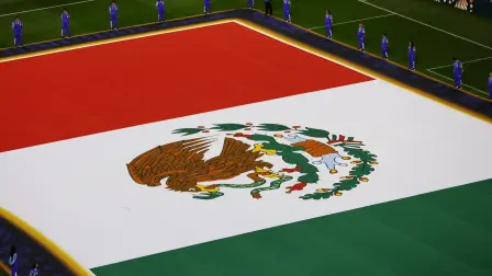 A Mexican flag is displayed on the pitch ahead of the 2026 World Cup Group A football match between the Czech Republic and Mexico at the Mexico City Stadium in Mexico City on June 24, 2026.  (Photo by Rodrigo Oropeza / AFP)