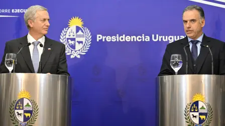 Chile's President Jose Antonio Kast (L) listens to Uruguay's President Yamandu Orsi during a meeting at the Suarez Residence in Montevideo on July 1, 2026. (Photo by Santiago Mazzarovich / AFP)