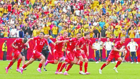 Soccer Football - FIFA World Cup 2026 - Round of 16 - Switzerland v Colombia - BC Place, Vancouver, Canada - July 7, 2026Switzerland's Djibril Sow and teammates celebrate after the penalty shootout as Switzerland qualify for the quarter finals of the World Cup IMAGN IMAGES via Reuters/Simon Fearn     TPX IMAGES OF THE DAY