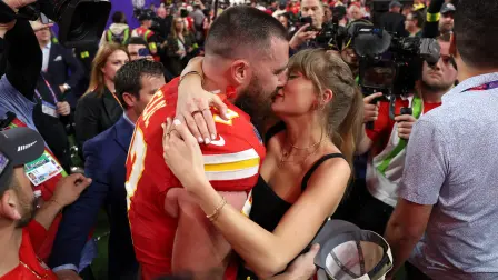 LAS VEGAS, NEVADA - FEBRUARY 11: Travis Kelce #87 of the Kansas City Chiefs kisses Taylor Swift after defeating the San Francisco 49ers 25-22 in overtime during Super Bowl LVIII at Allegiant Stadium on February 11, 2024 in Las Vegas, Nevada.   Ezra Shaw/Getty Images/AFP (Photo by EZRA SHAW / GETTY IMAGES NORTH AMERICA / Getty Images via AFP)
