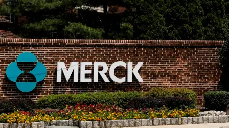 FILE PHOTO: The Merck logo is seen at a gate to the Merck & Co campus in Rahway, New Jersey, U.S., July 12, 2018. REUTERS/Brendan McDermid/File Photo