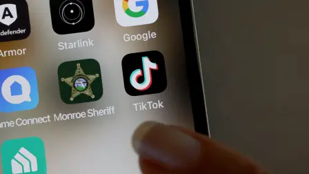 MIAMI, FLORIDA - APRIL 24: In this photo illustration, the TikTok app is displayed on an iPhone screen on April 24, 2024 in Miami, Florida. President Joe Biden signed a foreign aid package that includes a bill that would ban TikTok if China-based parent company ByteDance fails to sell the app to an American company within a year. (Photo illustration by Joe Raedle/Getty Images) (Photo by JOE RAEDLE / GETTY IMAGES NORTH AMERICA / Getty Images via AFP)