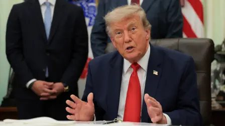 U.S. President Donald Trump speaks as he sits behind an airport model as he makes an announcement about a $22.5 billion renovation of Washington Dulles International Airport with U.S. Secretary of Transportation Sean Duffy (not pictured) in the Oval Office at the White House in Washington, D.C., U.S., July 29, 2026. REUTERS/Kylie Cooper