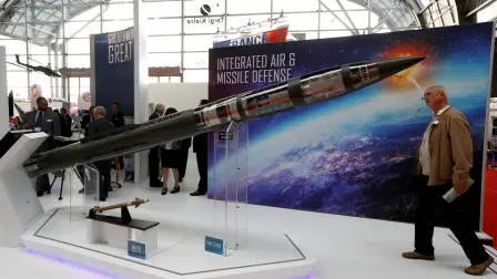 FILE PHOTO: A man looks at a Patriot Advanced Capability (PAC-3) Missile Segment Enhancement (MSE) model by Lockheed Martin at an international military fair in Kielce, Poland September 7, 2017. REUTERS/Kacper Pempel/File Photo