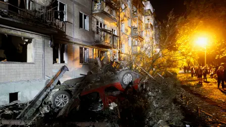 A damaged vehicle at the site of an apartment building hit by a Russian missile strike, amid Russia's attack on Ukraine, in Kyiv, Ukraine, August 1, 2026. REUTERS/Gleb Garanich