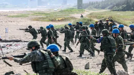 Taiwan military personnel conduct a live-fire exercise on Zhongfu Beach as part of annual Han Kuang military exercise, in New Taipei City on August 5, 2026. (Photo by I-Hwa Cheng / AFP)