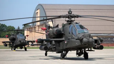 JOINT BASE ANDREWS, MARYLAND - JUNE 12: U.S. Army AH-64E Apache helicopters sit on the flight line on June 12, 2025 at Joint Base Andrews, Maryland. Army helicopters, including Black Hawks, Apaches, Chinooks, and other military aircraft, will be used in the upcoming U.S. Army's 250th birthday parade, which also coincides with Flag Day and U.S. President Trump's birthday.   Kayla Bartkowski/Getty Images/AFP (Photo by Kayla Bartkowski / GETTY IMAGES NORTH AMERICA / Getty Images via AFP)