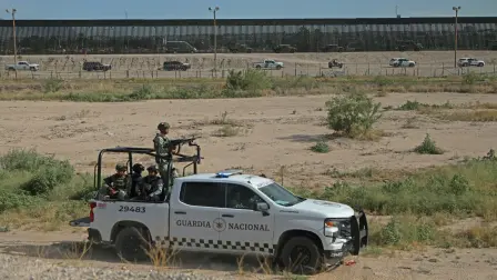 Members of Mexicos National Guard patrol the area as U.S. Customs and Border Protection (CBP) Air and Marine Operations (AMO) officers conduct a demonstration of their rapid response capabilities during a joint, combined exercise at the border between El Paso, Texas, U.S and Ciudad Juarez, Chihuahua, Mexico, on August 13, 2026. The exercise took place after the Juarez cartel was officially designated by the US as a foreign terrorist organization. (Photo by Herika Martinez / AFP)