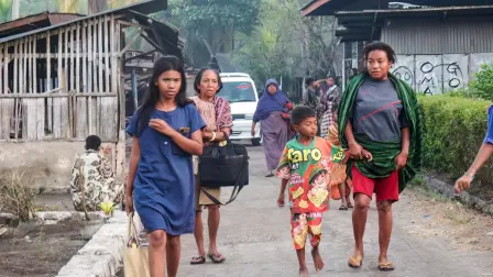Villagers flee their homes to seek safety following a earthquake in Talibura Village, Sikka, East Nusa Tenggara on August 15, 2026. A strong 7.7-magnitude earthquake struck off Flores island in eastern Indonesia early on August 15, the US Geological Survey and Indonesian authorities said, triggering a tsunami warning and prompting hundreds to evacuate. (Photo by ARNOLD WELIANTO / AFP)