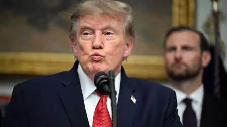 US President Donald Trump delivers remarks during a meeting with cryptocurrency executives in the Roosevelt Room of the White House in Washington, DC, on August 19, 2026. (Photo by Jim WATSON / AFP)