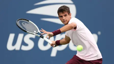 NEW YORK, NEW YORK - SEPTEMBER 02: Rafael Jodar of Spain returns a shot against Yunchaokete Bu of China during their Men's Singles Second Round match on Day Four of the 2026 US Open at USTA Billie Jean King National Tennis Center on September 02, 2026 in the Flushing neighborhood of the Queens borough of New York City.   Caleb Bowlin/Getty Images/AFP (Photo by Caleb Bowlin / GETTY IMAGES NORTH AMERICA / Getty Images via AFP)