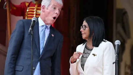 Venezuela's interim President Delcy Rodriguez (R) and US Energy Secretary Chris Wright (L) talk as they give a press conference after the signing of an oil agreement at the Miraflores Presidential Palace in Caracas on September 2, 2026. US Energy Secretary Chris Wright oversaw the signing of deals worth "tens of billions of dollars" between Venezuela and oil majors Chevron and ENI as well as with energy company GE Vernova on September 2, 2026. (Photo by Juan BARRETO / AFP)