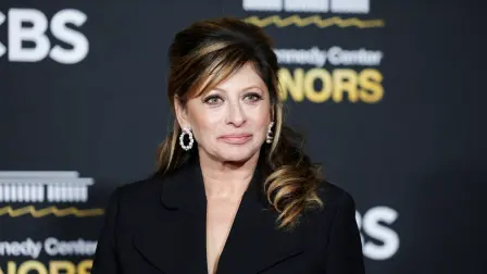 FILE PHOTO: Maria Bartiromo poses on the red carpet for the 2025 Kennedy Center Honors at the John F. Kennedy Center for the Performing Arts in Washington, D.C., U.S., December 7, 2025. REUTERS/Jeenah Moon/File Photo