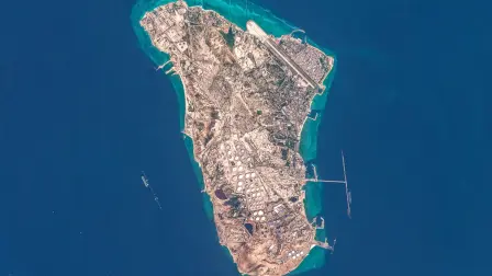 (FILES) This handout image taken by the European Space Agency (ESA) captured by the Copernicus Sentinel-2 satellite shows a view of Iran's Kharg Island, which hosts the countrys main crude export terminal and is responsible for the overwhelming majority of its oil shipments to the world, about 30 kilometres south of the mainland in the north of the Gulf, on March 7, 2026. Iranian media on September 5, 2026, reported several explosions near the country's major oil hub of Kharg Island in the Gulf, days after renewed fighting broke out with the United States. Fars news agency said blasts were heard by its correspondent but that there was no smoke visible, while the SNN news agency claimed "an Iranian tanker was targeted by the US" near the island. (Photo by EUROPEAN SPACE AGENCY / AFP) / RESTRICTED TO EDITORIAL USE - MANDATORY CREDIT "AFP PHOTO / ESA" - HANDOUT - NO MARKETING NO ADVERTISING CAMPAIGNS - DISTRIBUTED AS A SERVICE TO CLIENTS