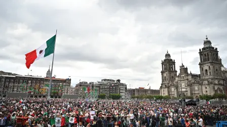 People demonstrate during the Mexico's Independence Day celebration at the Zocalo square in Mexico City on September 15, 2025. (Photo by Yuri CORTEZ / AFP)