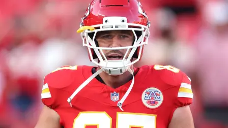 KANSAS CITY, MISSOURI - SEPTEMBER 14: Travis Kelce #87 of the Kansas City Chiefs looks on prior to the game against the Denver Broncos at Arrowhead Stadium on September 14, 2026 in Kansas City, Missouri.   Jamie Squire/Getty Images/AFP (Photo by JAMIE SQUIRE / GETTY IMAGES NORTH AMERICA / Getty Images via AFP)
