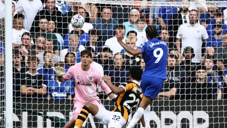 Chelsea's Brazilian striker #09 Joao Pedro (R) wactches his sot in to the net as he scores the team's second goal during the English Premier League football match between Chelsea and Hull City at Stamford Bridge in London on September 12, 2026. (Photo by Henry NICHOLLS / AFP) / RESTRICTED TO EDITORIAL USE. No use with unauthorized audio, video, data, fixture lists, club/league logos or 'live' services. Online in-match use limited to 120 images. An additional 40 images may be used in extra time. No video emulation. Social media in-match use limited to 120 images. An additional 40 images may be used in extra time. No use in betting publications, games or single club/league/player publications. /