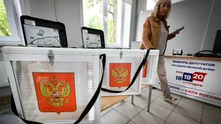 A member of a local electoral commission inspects a polling station ahead of the upcoming election to the Russian State Duma (lower house of Russia's Parliament) in central Moscow on September 17, 2026. Russia will vote for the Duma's election on September 18-20, 2026. (Photo by Alexander NEMENOV / AFP)